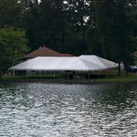 30'x60' Frame Tent with married 30'x40' Frame Tent by lake