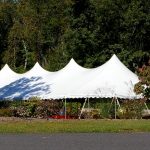 40x100 Pole Tent with bronze statue in front
