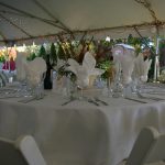 Simple Buffet Table Setting with Water Goblet, Wine Glass, and White Napkin set prior to a wedding