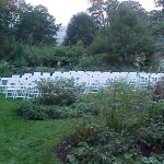 White Party Chairs set for Wedding Ceremony in a Garden