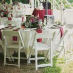 White Party Chairs at Round Tables