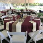 White Party Chairs at Round Tables