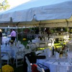 White Party Chairs at Round Tables